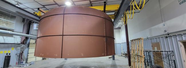 The dome shape of the tornado simulator is designed to reduce energy loss as the system operates. (Photograph courtesy of Guirong (Grace) Yan)